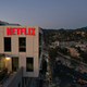 A building bearing the Netflix logo.